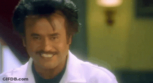 Man With Mustache In White Shirt Smiling GIF