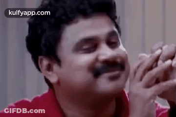 Man With Mustache Laughing Covering Face GIF