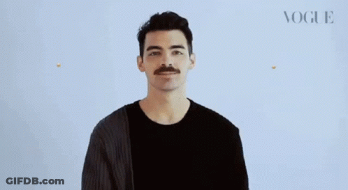 Man With Mustache Laughing Tears GIF