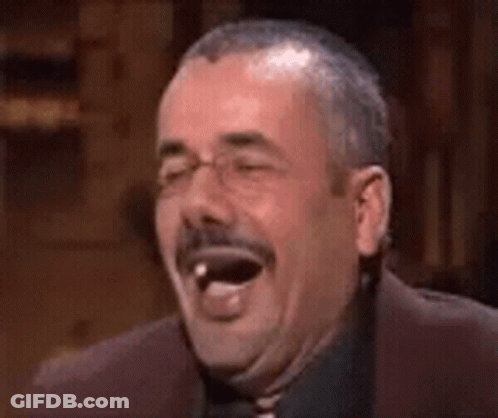 Man With Mustache Laughing With Tongue Out GIF