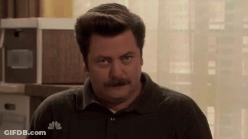 Man With Mustache Looking At Camera GIF