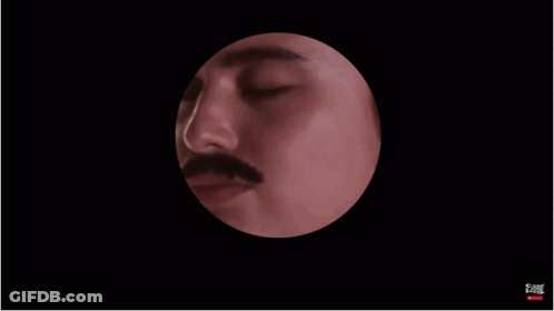 Man With Mustache Looking Through Telescope GIF