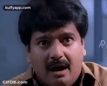 Man With Mustache Making Funny Face GIF
