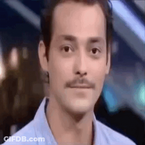 Man With Mustache Making Funny Face GIF