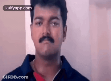 Man With Mustache Making Funny Face GIF