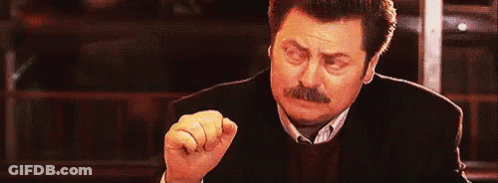 Man With Mustache Making Funny Face And Raising Fist GIF