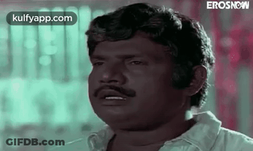 Man With Mustache Making Funny Face GIF