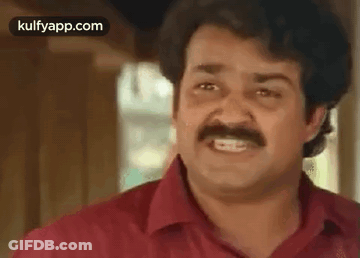 Man With Mustache Making Funny Face GIF