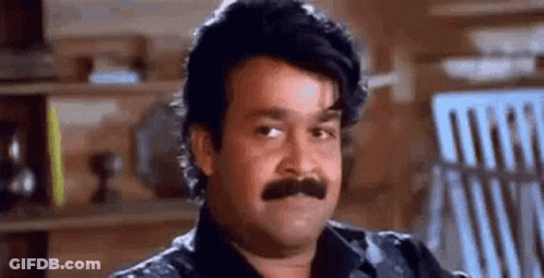 Man With Mustache Making Funny Face GIF