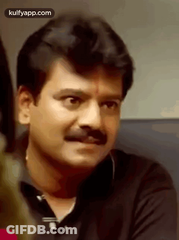 Man With Mustache Making Funny Face GIF