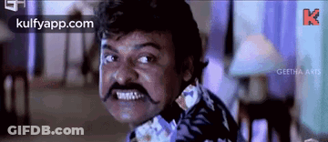 Man With Mustache Making Funny Face GIF