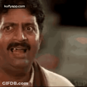 Man With Mustache Making Funny Face GIF