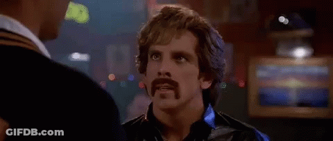 Man With Mustache Next To Another Man GIF