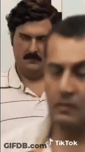 Man With Mustache Next To Man With TikTok Sticker GIF