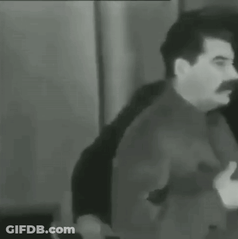 Man With Mustache Next To Suit GIF