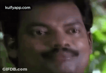 Man With Mustache On Green Background GIF