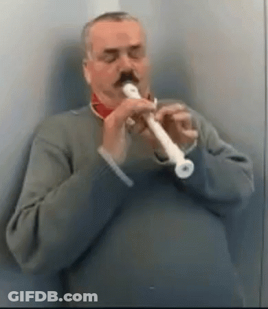 Man With Mustache Playing Recorder In Bathroom GIF