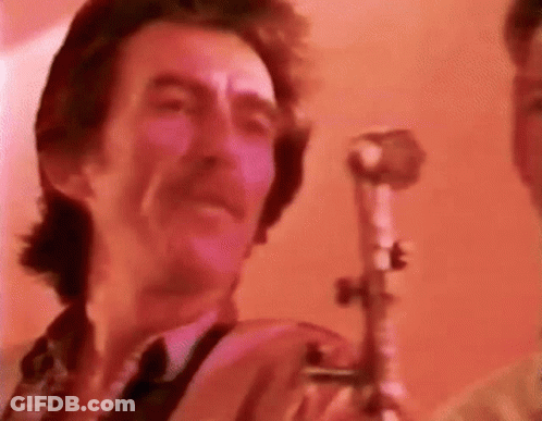 Man With Mustache Playing Saxophone At Microphone GIF