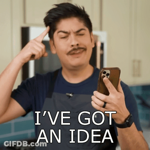 Man With Mustache Pointing At Head Saying Ive Got An Idea GIF