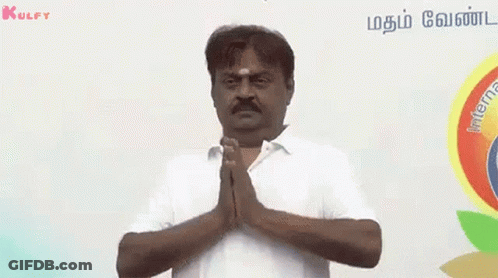Man With Mustache Praying Before Foreign Sign GIF