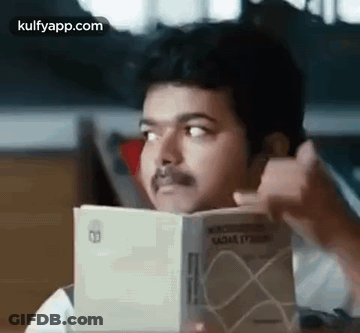Man With Mustache Reading Book GIF