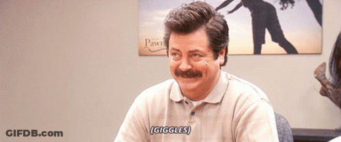 Man With Mustache Saying Giggles In Front Of Woman GIF