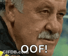 Man With Mustache Saying Oof In Front Of Face GIF