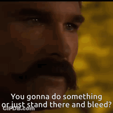 Man With Mustache Saying You Gonna Do Something Or Just Stand There And Bleed GIF
