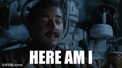 Man With Mustache Says Here Am I In Dark Room GIF