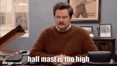 Man With Mustache Sitting At Desk Half Mast Is Too High GIF