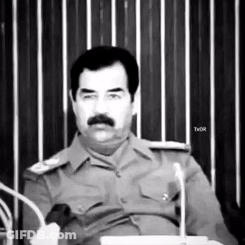 Man With Mustache Sitting At Microphone GIF