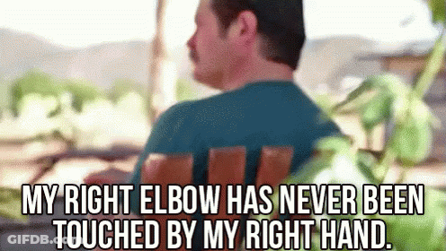 Man With Mustache Sitting In Chair GIF
