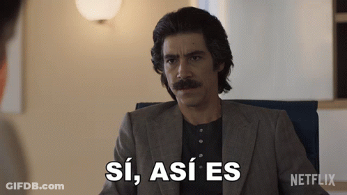 Man With Mustache Sitting In Chair With Netflix Logo GIF