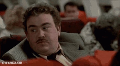 Man With Mustache Sitting On Airplane GIF