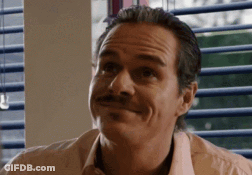 Man With Mustache Smiling At Camera GIF