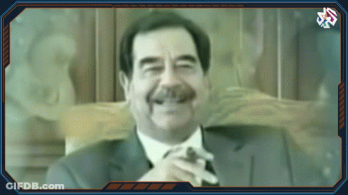 Man With Mustache Smiling At Screen Saying A3 GIF