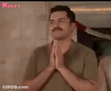 Man With Mustache Smiling Holding Hands Together GIF