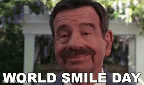 Man With Mustache Smiling World Smile Day GIF