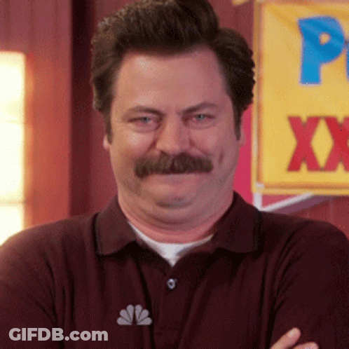 Man With Mustache Standing In Front Of Banner Saying P XX GIF