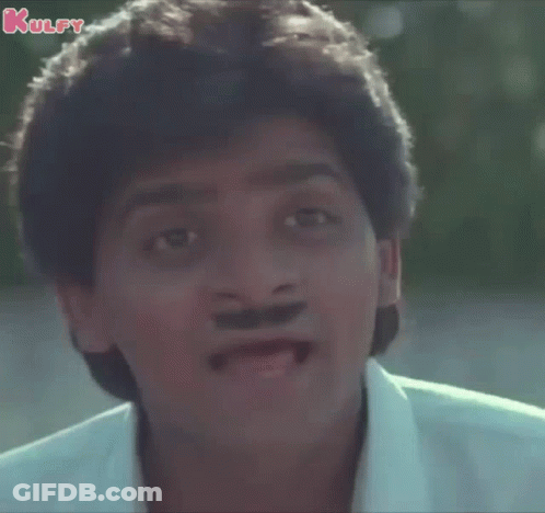 Man With Mustache Sticking Tongue Out GIF