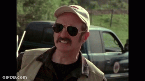 Man With Mustache, Sunglasses, And Hat By Truck GIF