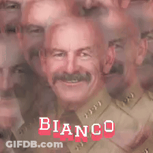 Man With Mustache Surrounded By Other Men And Bianco GIF
