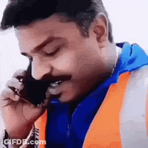 Man With Mustache Talking On Phone GIF