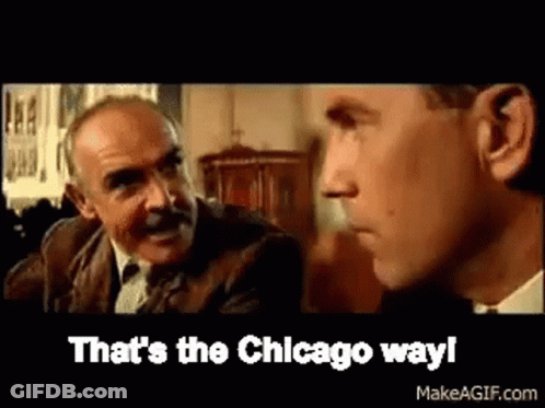 Man With Mustache Talking To Another Man GIF