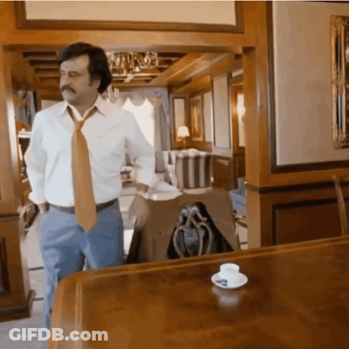 Man With Mustache Talking To Another Man GIF