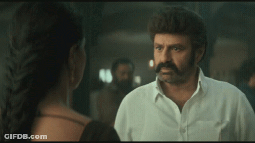Man With Mustache Talking To Woman GIF