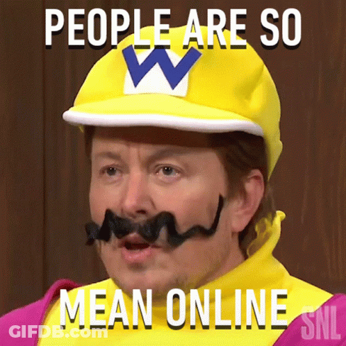 Man With Mustache Wario Hat Says People Are Mean GIF