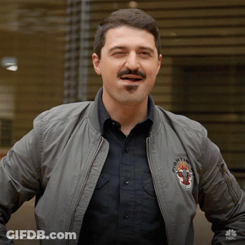 Man With Mustache Wearing Bomber Jacket Saying Chicago Fire GIF