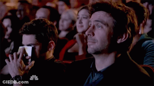 Man With NBC Shirt Watching Show GIF