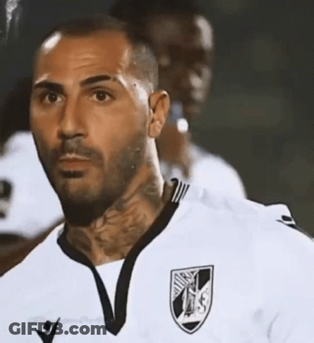 Man With Neck Tattoo In White Jersey Black Collar GIF